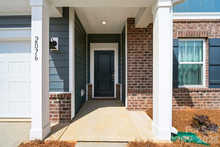 Exterior details and patio area of a home in Buffalo Ridge, Newton (Image 29).