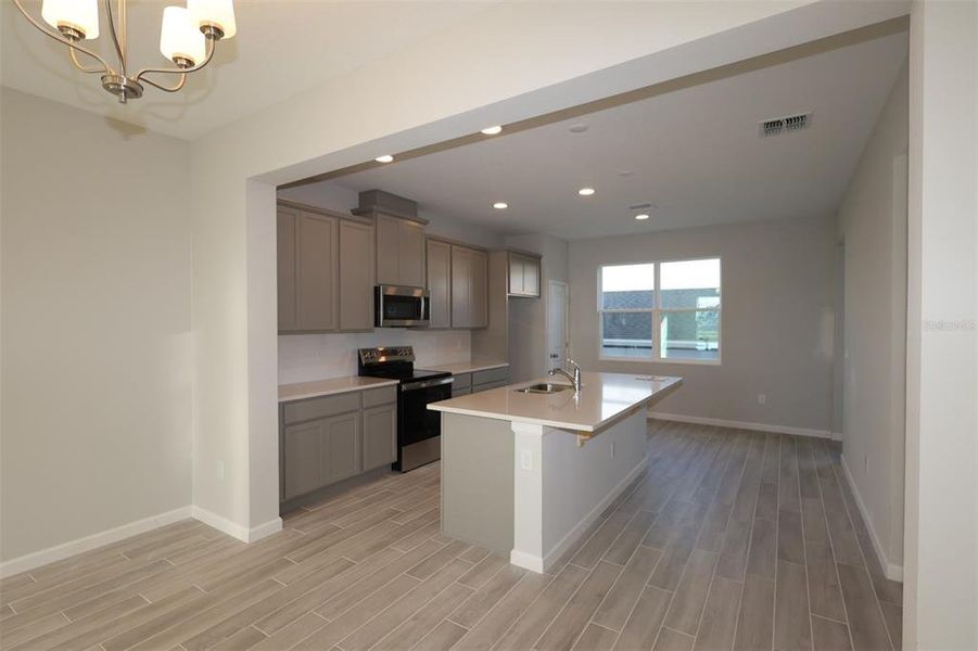 Furnished interior view inside a new home in Tribute at Ovation, Winter Garden (Image 15). Furnished interior view inside a new home in Tribute at Ovation, Winter Garden (Image 15).