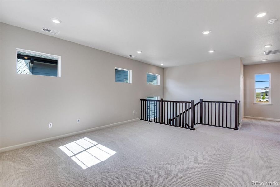 Spacious, unfurnished interior of a new home in Crescendo at The Aurora Highlands, Aurora (Image 25).