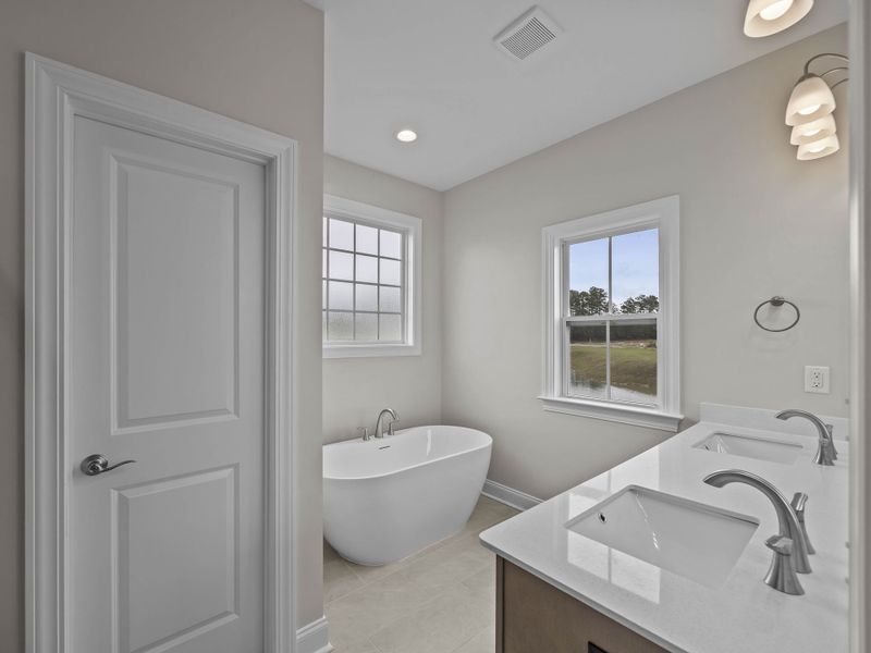 Furnished interior view inside a new home in The Villas at Langston Farms, Winterville (Image 11).