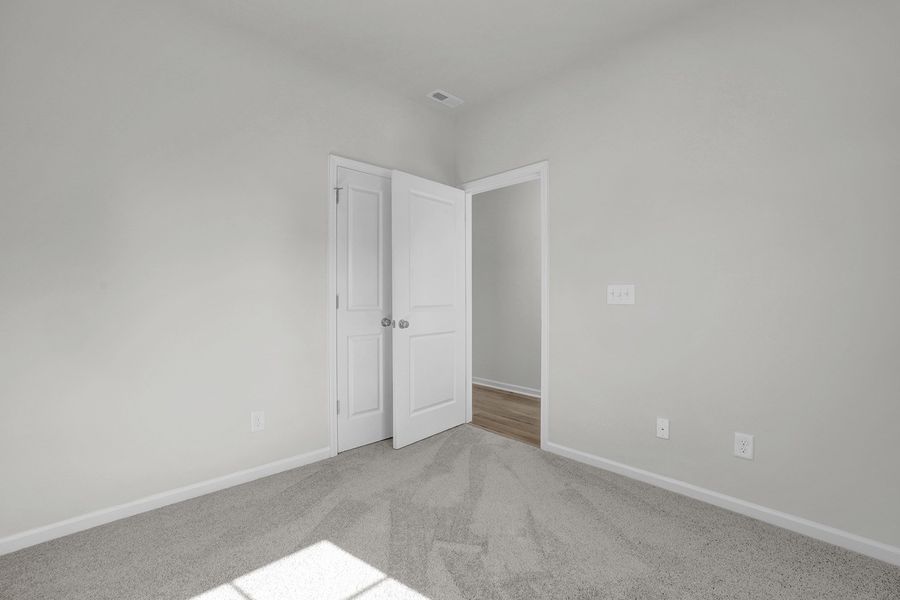 Spacious, unfurnished interior of a new home in River Tide Farms, Bolivia (Image 21).