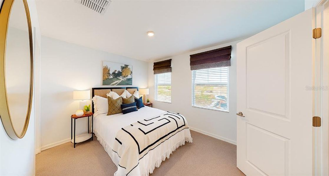 Furnished interior view inside a new home in The Townhomes at Westview, Kissimmee (Image 10).