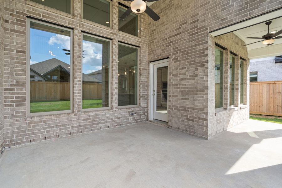 Exterior details and patio area of a home in Bridgeland 55', Cypress (Image 4).
