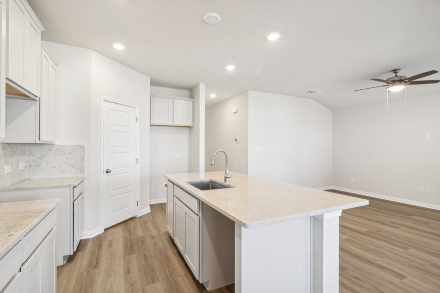 Kitchen in the Briscoe floorplan at a Meritage Homes community.