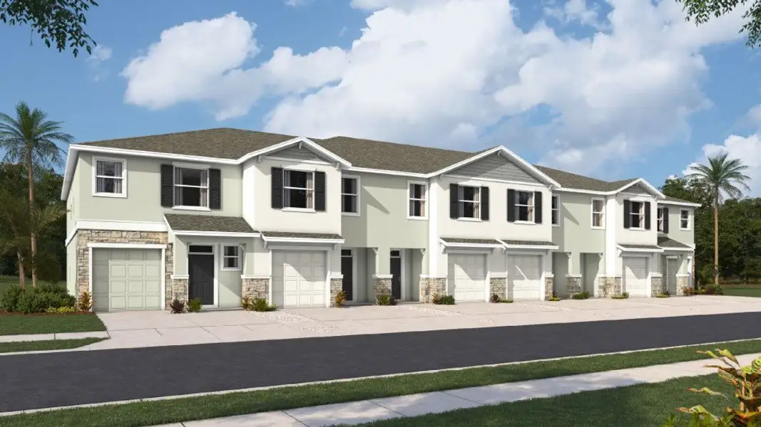 Front exterior of a new home in Angeline Townhomes, Land O' Lakes, FL, highlighting curb appeal (Image 2). Front exterior of a new home in Angeline Townhomes, Land O' Lakes, FL, highlighting curb appeal (Image 2).