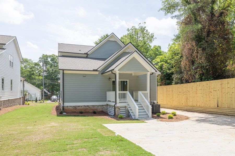 Exterior details and patio area of a home in East Marable Street, Monroe (Image 3).