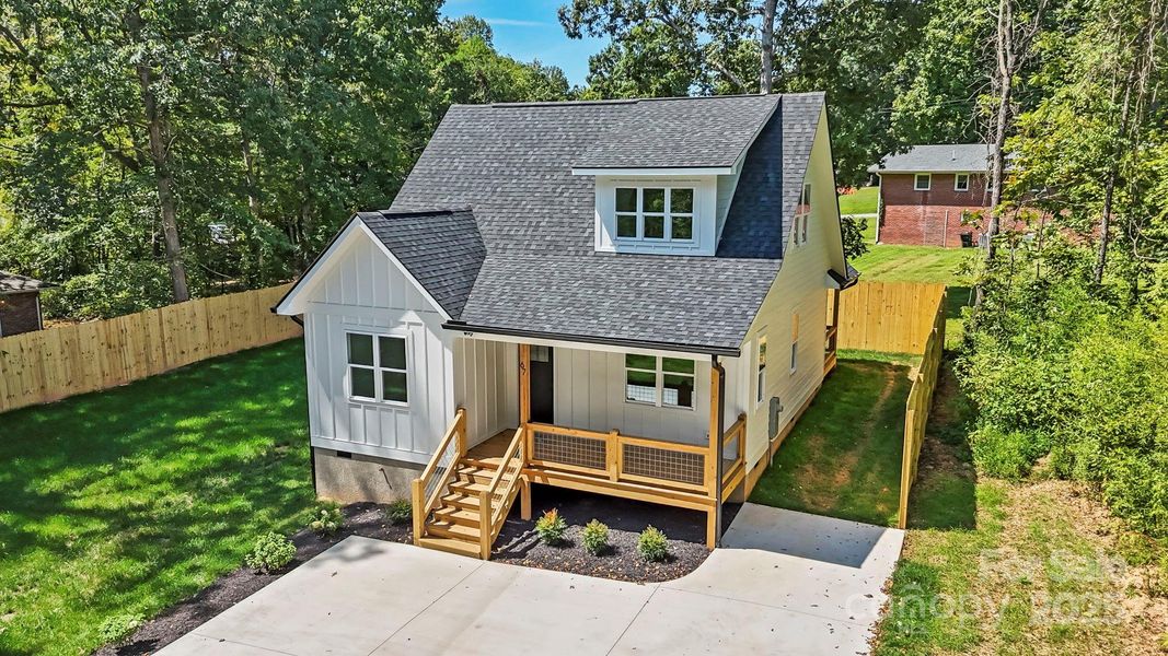 Front exterior of a new home in , Flat Rock, NC, highlighting curb appeal (Image 21).