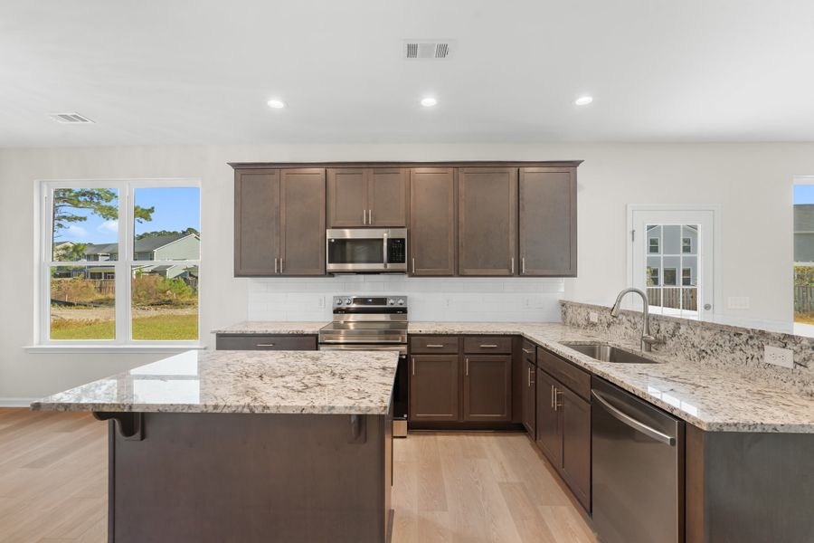 Representative furnished interior of a home built from the The Dalton by Smith Family Homes in Ramsey Landing, Rincon (Image 8).