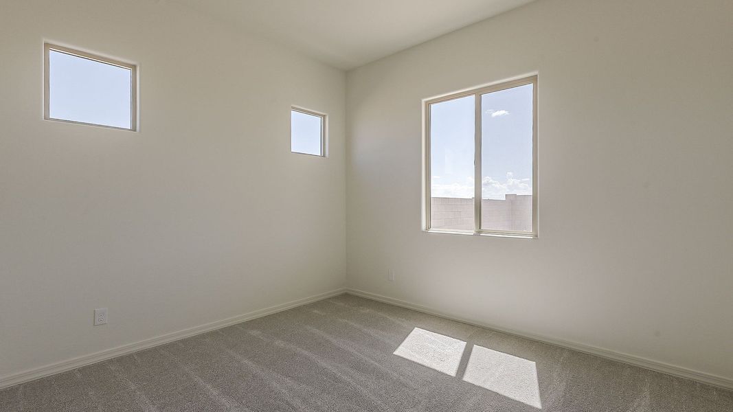 Furnished interior view inside a new home in Windrose, Waddell (Image 26).