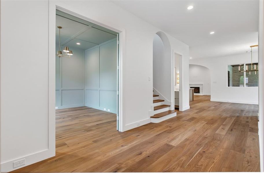 The study on the left accented with French doors