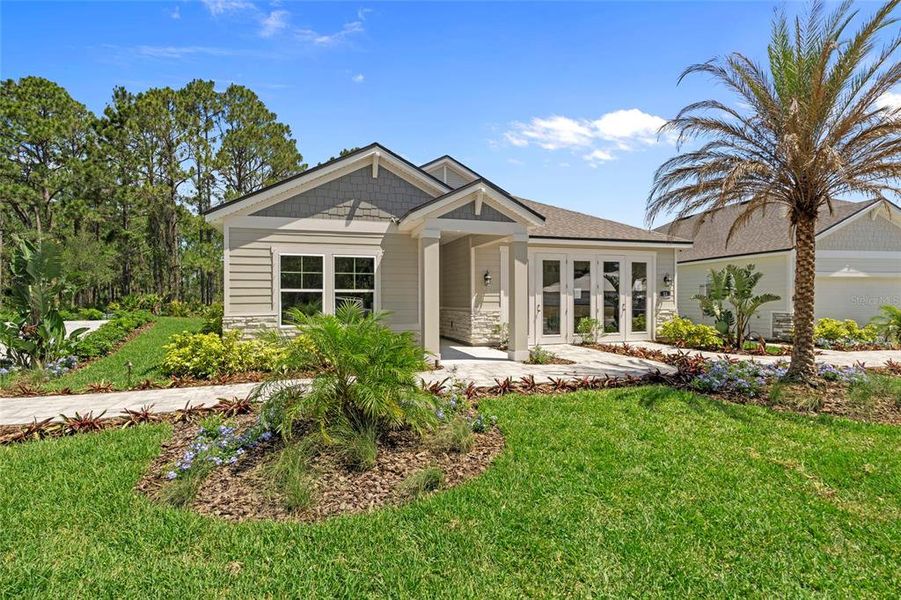 Front exterior of a new home in Reserve East, Flagler Beach, FL, highlighting curb appeal (Image 20).