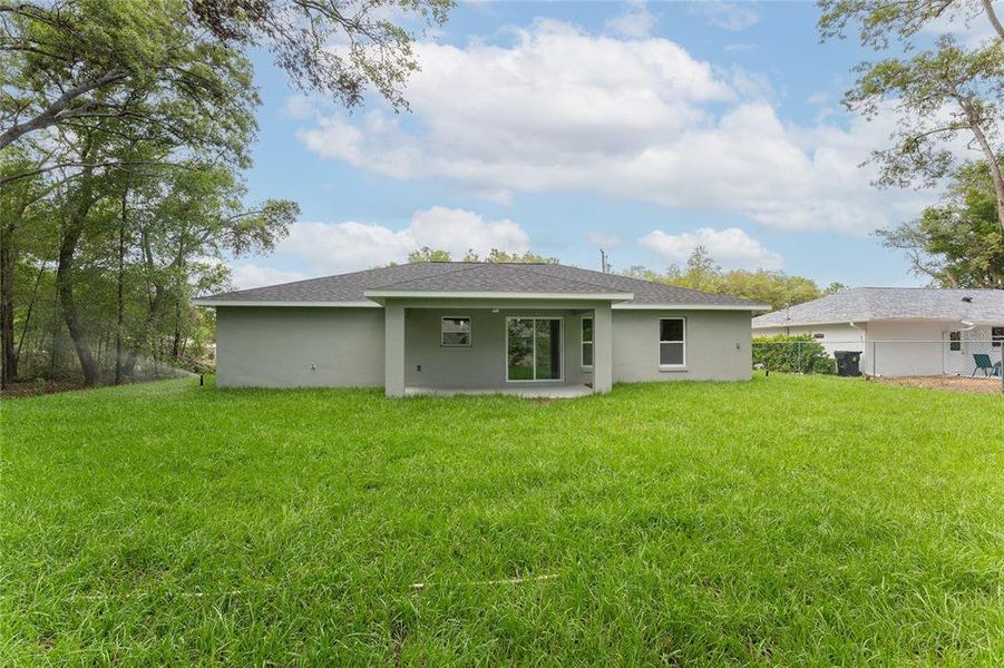 Exterior details and patio area of a home in , Citrus Springs (Image 20).
