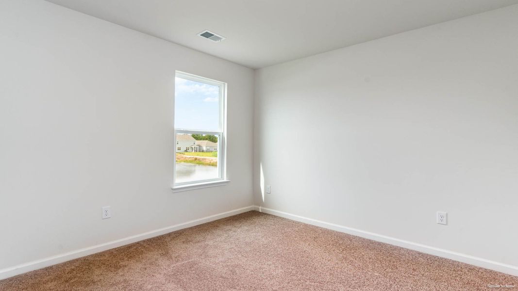 Spacious, unfurnished interior of a new home in Indigo Preserve, Leland (Image 19).