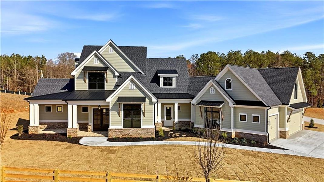 Front exterior of a new home in , Woodstock, GA, highlighting curb appeal (Image 25). Front exterior of a new home in , Woodstock, GA, highlighting curb appeal (Image 25).