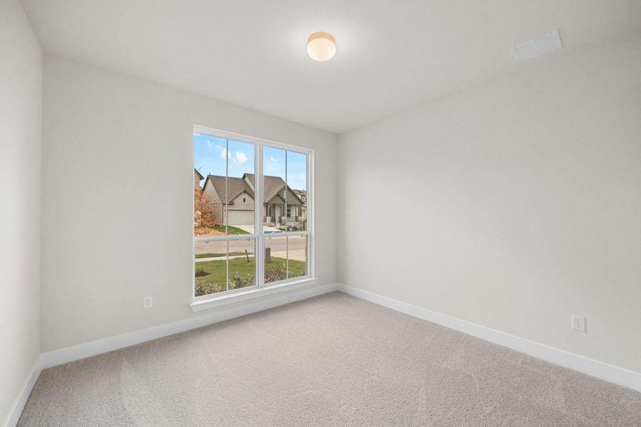 Spacious, unfurnished interior of a new home in The Colony, Bastrop (Image 19).