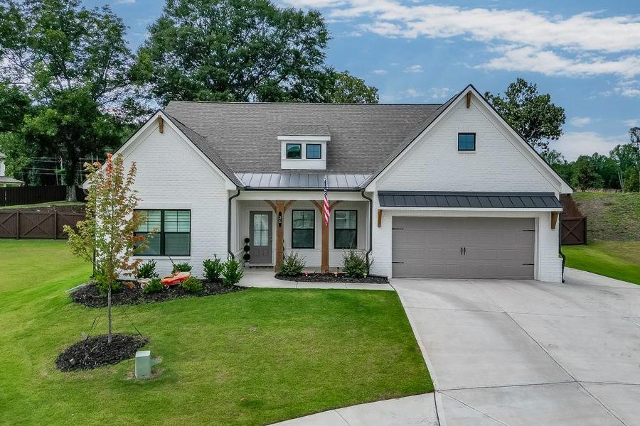 Front exterior of a new home in Rosewood Lake Estates, Hoschton, GA, highlighting curb appeal (Image 19). Front exterior of a new home in Rosewood Lake Estates, Hoschton, GA, highlighting curb appeal (Image 19).