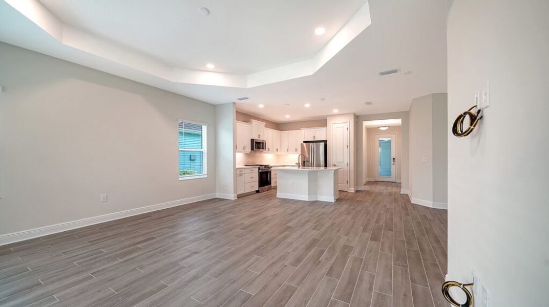 Spacious, unfurnished interior of a new home in Windward Real Estate and Homes for Sale in Sarasota, FL - Neal Communities, Lakewood Ranch (Image 26).