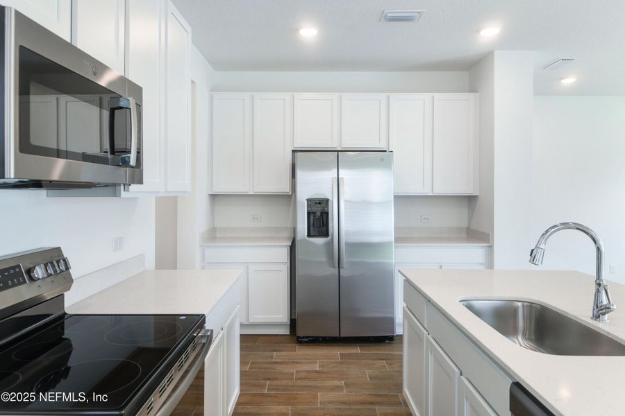 Furnished interior view inside a new home in Seasons at Park Trace, Jacksonville (Image 4).