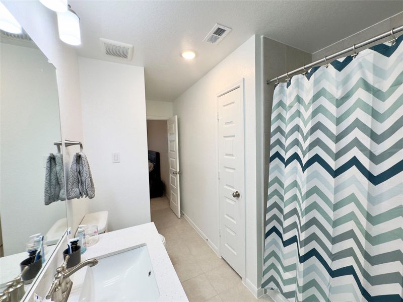 Furnished interior view inside a new home in Lakeview, Waller (Image 17).