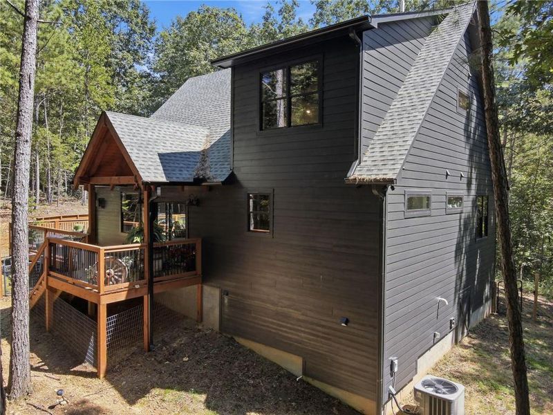 Exterior details and patio area of a home in , Ellijay (Image 25).
