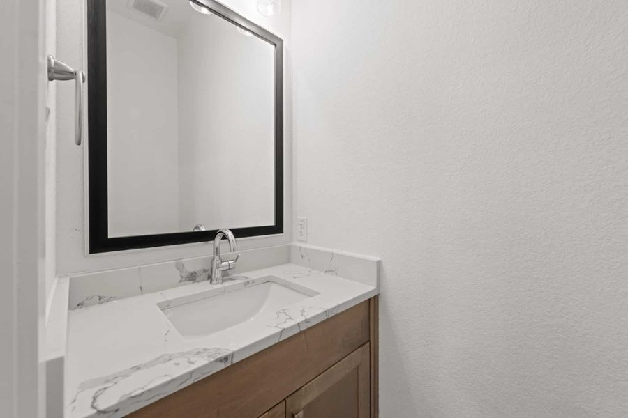 Representative interior finishes for a home built from the Malani – 60′ Lot by Chesmar Homes in Fulshear Lakes, Fulshear (Image 13).