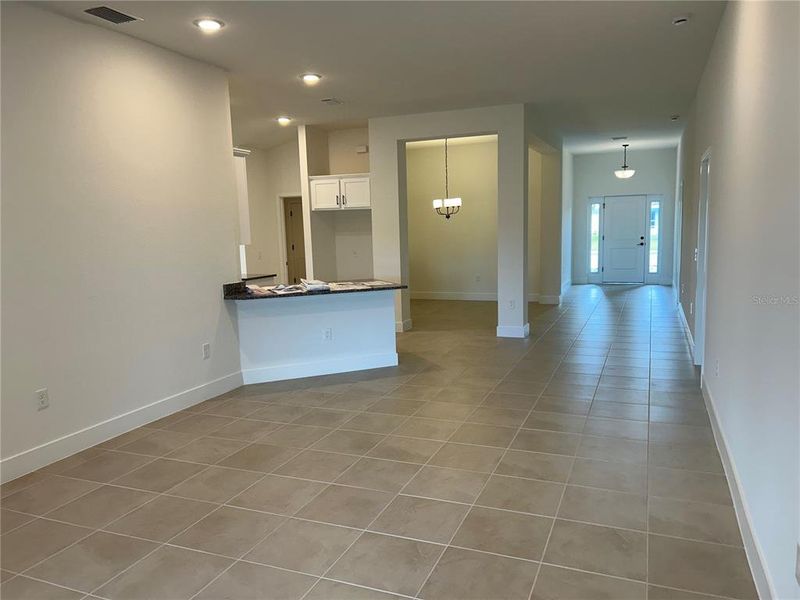 Spacious, unfurnished interior of a new home in Watercress Cove, North Port (Image 9).