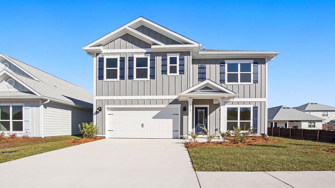 Representative exterior photo of a completed home built from the Carol by D.R. Horton in Bayside at Ward Creek, Panama City Beach, FL (Image 1). Representative exterior photo of a completed home built from the Carol by D.R. Horton in Bayside at Ward Creek, Panama City Beach, FL (Image 1).