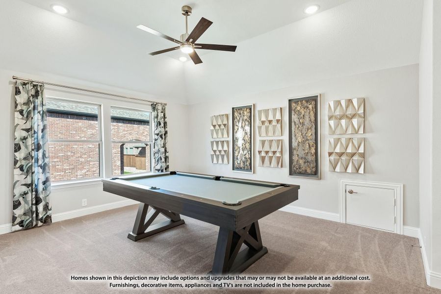 Game room with pool table, ceiling fan, carpet flooring, and decorative wall art panels Game room with pool table, ceiling fan, carpet flooring, and decorative wall art panels