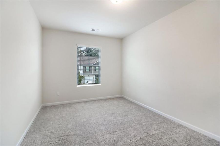 Spacious, unfurnished interior of a new home in Cambridge at Towne Center, Hoschton (Image 22).