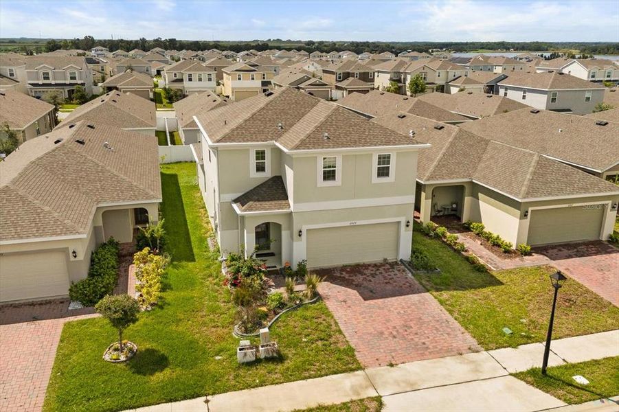 Front exterior of a new home in , Groveland, FL, highlighting curb appeal (Image 1). Front exterior of a new home in , Groveland, FL, highlighting curb appeal (Image 1).