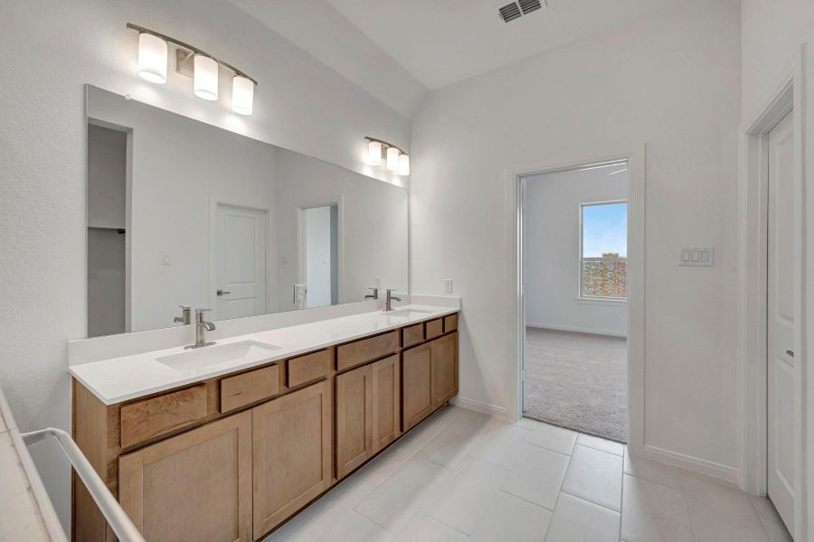 Furnished interior view inside a new home in Beacon Point at Lago Mar 50’ Homesites, Texas City (Image 7).