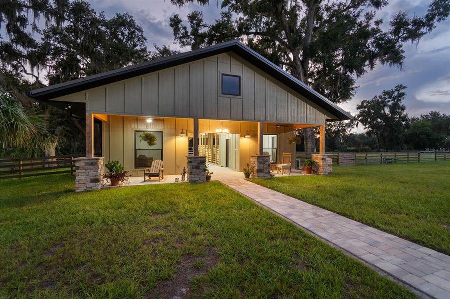 Front exterior of a new home in , Lithia, FL, highlighting curb appeal (Image 23).