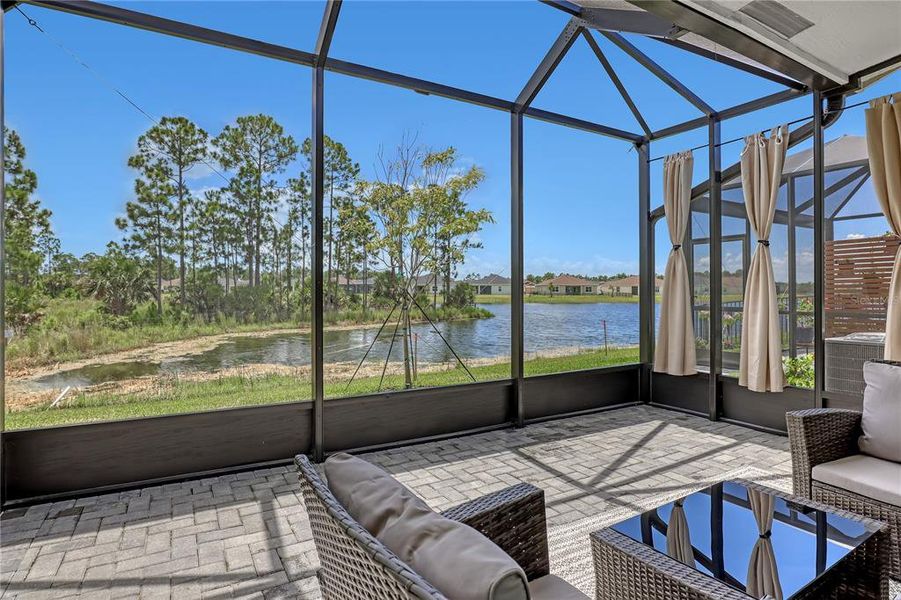 Exterior details and patio area of a home in The Timbers at Everlands, Palm Bay (Image 28).
