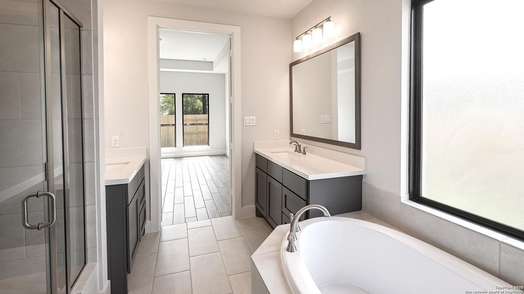 Furnished interior view inside a new home in Cibolo Valley Heights 65', Cibolo (Image 11).