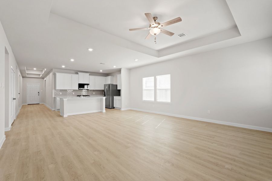 A large empty living room. A large empty living room.