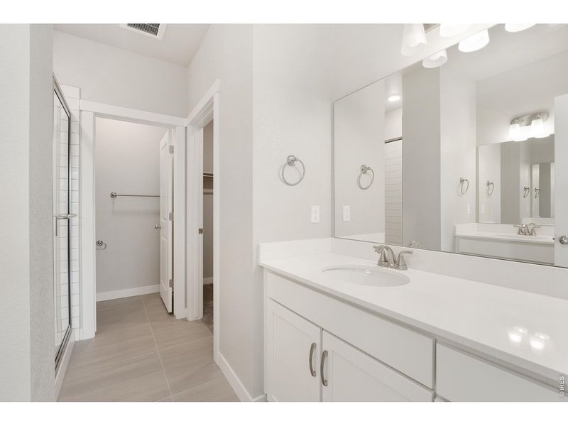 Furnished interior view inside a new home in The Lakes at Centerra - Discovery, Loveland (Image 10).