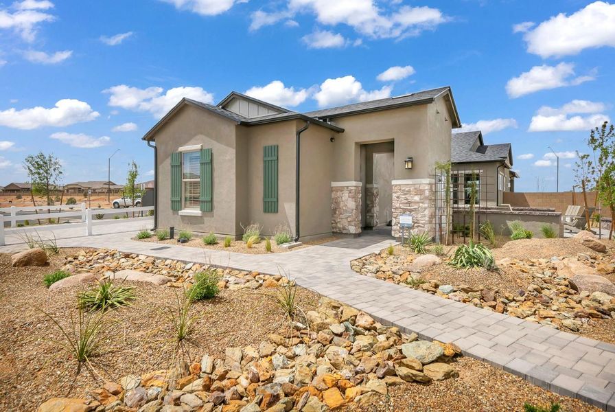 Front exterior of a new home in Summit at The Dells, Prescott, AZ, highlighting curb appeal (Image 25).