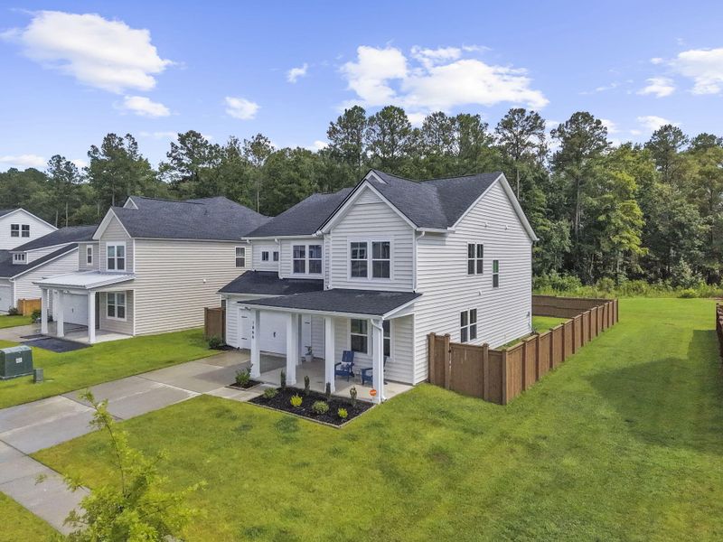 Front exterior of a new home in , Summerville, SC, highlighting curb appeal (Image 28). Front exterior of a new home in , Summerville, SC, highlighting curb appeal (Image 28).