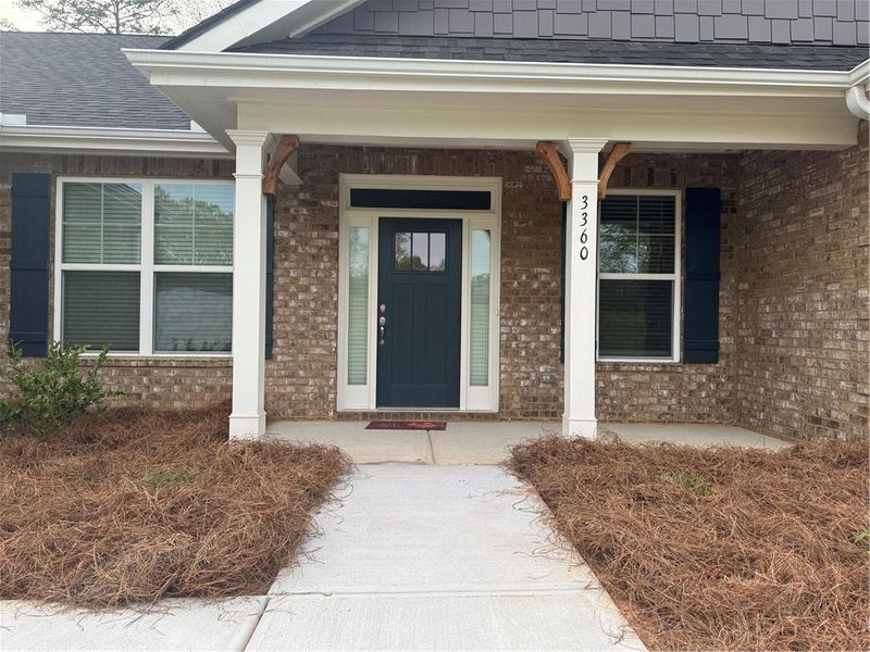 Exterior details and patio area of a home in Tuscany Hills, Douglasville (Image 16).