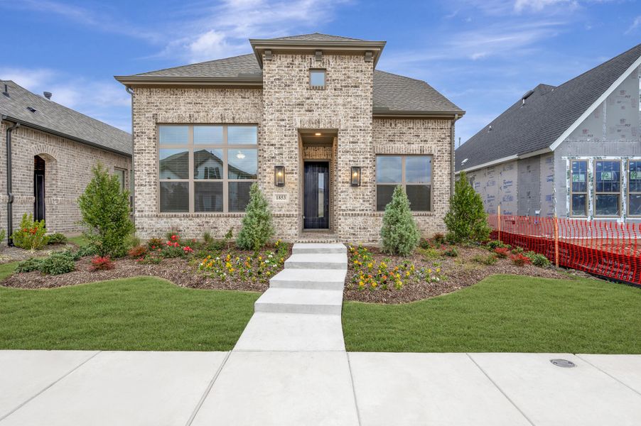 Front exterior of a new home in Mantua Point Gardens, Van Alstyne, TX, highlighting curb appeal (Image 1). Front exterior of a new home in Mantua Point Gardens, Van Alstyne, TX, highlighting curb appeal (Image 1).