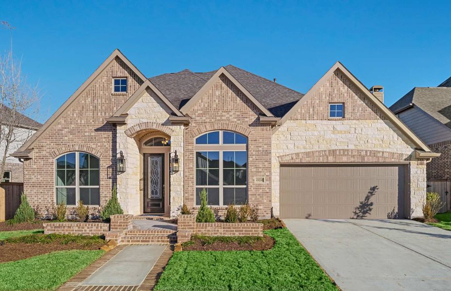Representative exterior photo of a completed home built from the 3546 by Ravenna Homes in Cross Creek West, Fulshear, TX (Image 22). Representative exterior photo of a completed home built from the 3546 by Ravenna Homes in Cross Creek West, Fulshear, TX (Image 22).