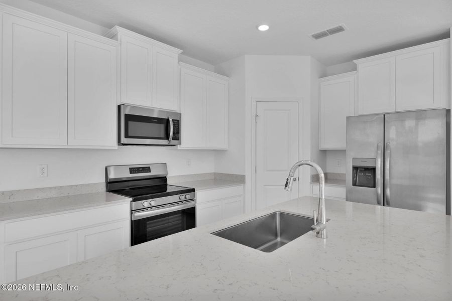 Furnished interior view inside a new home in , Jacksonville (Image 12).