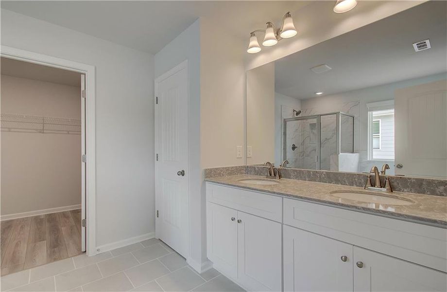 Furnished interior view inside a new home in Enclave at Evergreen, Fairburn (Image 14).