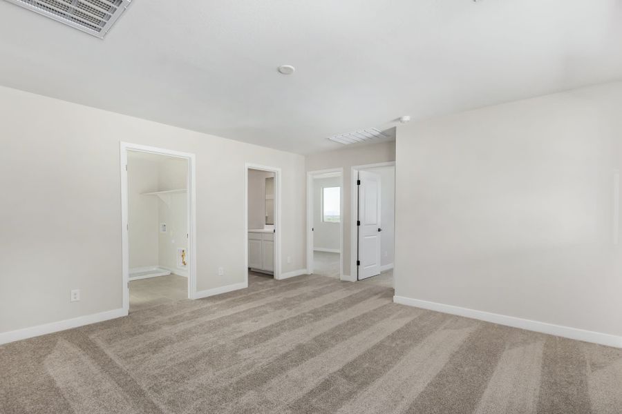 Spacious, unfurnished interior of a new home in Solvida at Estrella, Goodyear (Image 31).