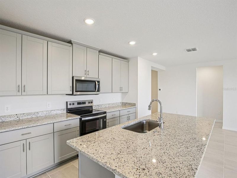 Furnished interior view inside a new home in The Reserve at Hammock Oaks - Signature Series, Lady Lake (Image 3).