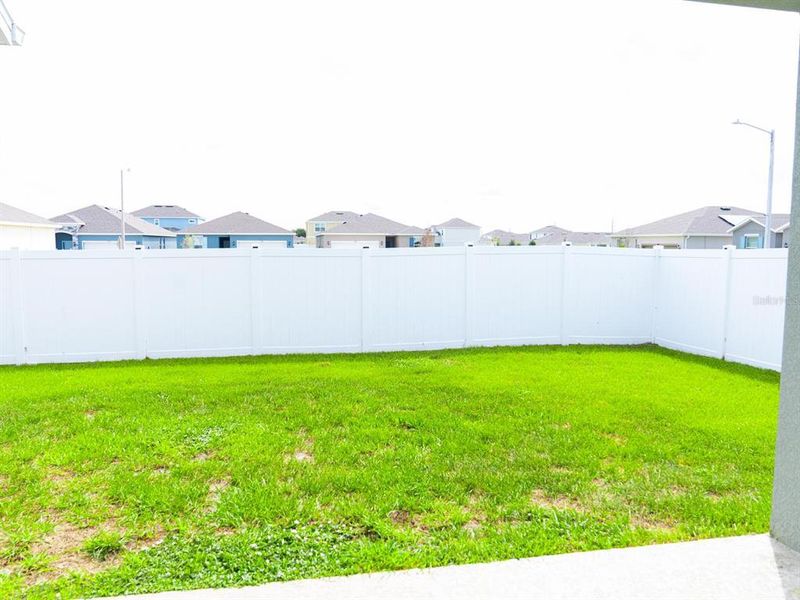 Exterior details and patio area of a home in Cypress Park Estates, Haines City (Image 17).