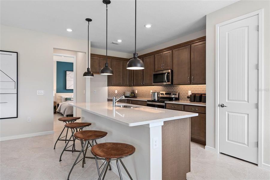 Furnished interior view inside a new home in Tohoqua, Kissimmee (Image 19).