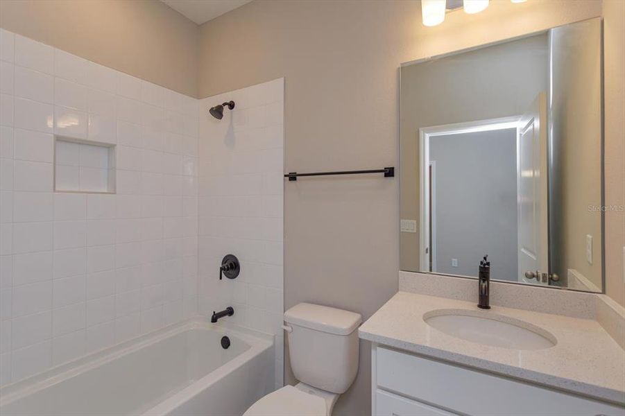 Furnished interior view inside a new home in Serenade at Ovation, Winter Garden (Image 12).