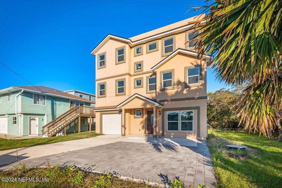 Front exterior of a new home in , St. Augustine, FL, highlighting curb appeal (Image 28).