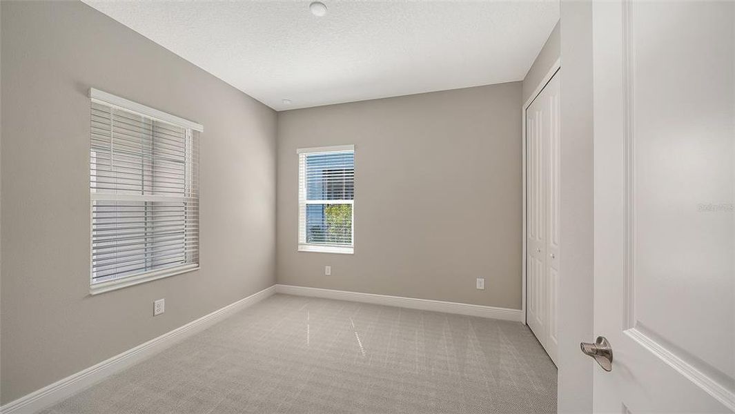 Spacious, unfurnished interior of a new home in Palm Grove, Lakewood Ranch (Image 37).